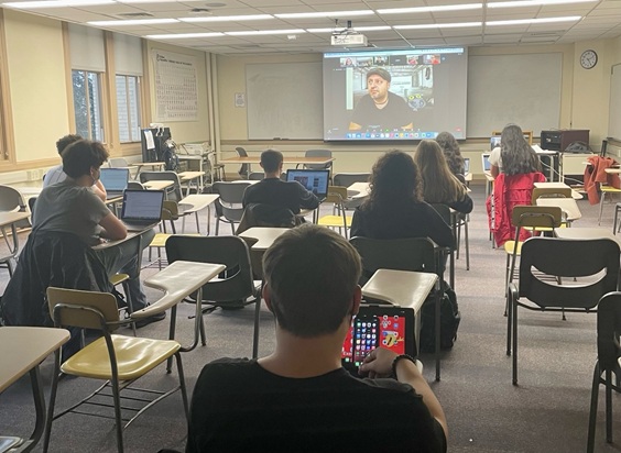 Students sitting at desks in a classroom