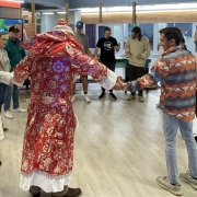 Students dancing in a circle
