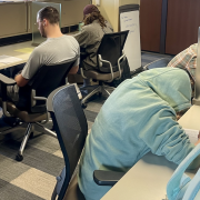 Students sitting in a conference room