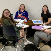 Students sitting in a conference room