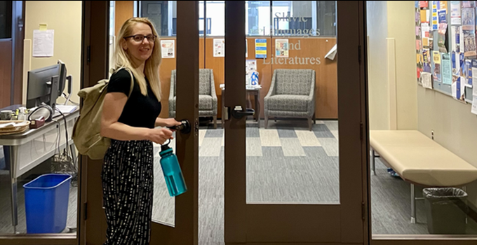 A professor walking into their office