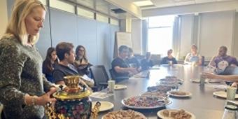 People sitting around a conference table