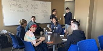 Students working in a group in class