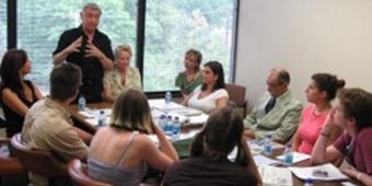 People talking around a conference table